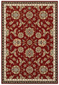 a red and black rug with an ornate design on the bottom, in front of a white background