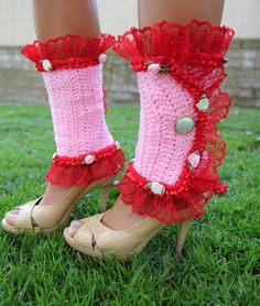 Be charmed and delighted with lacy, Victorian style leg warmers...perfect for a tea party, Valentine's Day, or anytime you're feeling whimsical!! These elegantly cozy spats feature crochet work in a lovely pastel pink yarn and come trimmed with a froth of ruffled red lace and organza trim. Tiny satin rosettes and pretty pearl buttons, plated in 24k gold, complete this fairytale look. -Sizes XXS-XL. (See image 5 for the size chart, and chose your size, in combination with your height, from the dr Cute Pink Leg Warmers For Spring, Cute Fitted Leg Warmers For Spring, Style Leg Warmers, Tee Party, Kawaii Accessories, Pink Yarn, Red Lace, Victorian Style, Goth Fashion