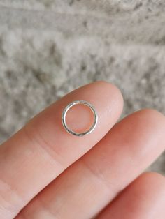 6mm: a mini size, usually for tragus piercing. 7mm: snug fit. 8mm: seems to work for most piercing. 9mm: good for ear lobe or loose fit for upper ear. Only for an healed piercing. ★24 gauge Rose gold ring with beads: https://www.etsy.com/ca/listing/253755273/24-gauge-rose-gold-with-beadsnose?ref=shop_home_active_1 ★Please read our polices before ordering: https://www.etsy.com/ca/shop/PersonalizedLayered/policy?ref=shopinfo_policies_leftnav ★Our store: https://www.etsy.com/ca/shop/PersonalizedLay Hypoallergenic Sterling Silver Huggie Rings, Everyday Sterling Silver Internally Threaded Septum Ring, Hypoallergenic Huggie Sterling Silver Rings, Hypoallergenic Sterling Silver Round Piercings, Sterling Silver Round Piercings For Everyday, Everyday Sterling Silver Round Piercings, Dainty Nose Rings For Everyday Wear, Dainty Everyday Nose Rings, Tiny Round Cartilage Earrings For Anniversary