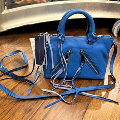 Rebecca Minkoff Mirco Moto Crossbody Leather Blue Purse. Size: L 9in, H 6in, W 3in Brand New With Tags. Never Used, Perfect Condition Comes With Duster Bag Designer Blue Shoulder Bag With Zipper Closure, Designer Blue Bag With Zipper Closure, Designer Blue Bags With Zipper Closure, Rebecca Minkoff Crossbody Bag, Rebecca Minkoff Mini Mac, Leather Waist Bag, Suede Purse, Feed Bags, Black Crossbody Purse