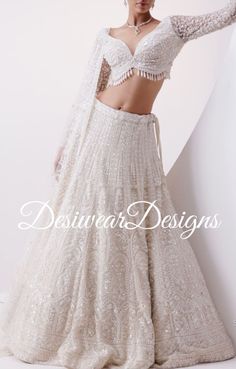 Made to Order/Measurement/Custom Order Lehenga - Color : white - Fabric : Embroidered Georgette  - Fully flared paneled lehenga - Embroidered  Blouse -  Net Dupatta with Border - Drawstring closure with Tassels - - It can be customize in any design or size  PLEASE NOTE: BUYERS ARE RESPONSIBLE FOR ANY CUSTOMS AND IMPORT TAXES THAT MAY APPLY. This is a made to order product. If you opt for 'Made To Measurement Option', we will provide a measurement template and you can share the measurements likewise. If you want to opt for 'Standard Size', Please refer to the size chart provided in the listing. Shipping: Standard Shipping is done by DHL ecommerce and it mostly takes 2 to 3 weeks to deliver after dispatch. Express Shipping is done by DHL express and it mostly delivers within a week after dis White Lengha Choli, White Lengha, Lehenga Simple, Lehenga For Wedding, Heavy Lehenga, Choli For Women, White Lehenga, Trendy Outfits Indian, Diwali Outfits