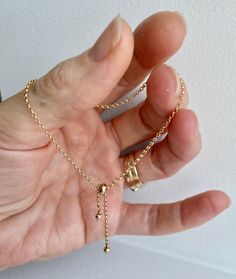 A dainty gold filled every day bracelet! It slips on so easily and adjusts with a 14k gold filled 4mm slider bead to your desired fit! So delicate and dainty on its own or excellent little addition to stacking a few pretties on your wrist! The chain is 14k gold filled rolo style 8.5 inches long **PLEASE** if you require a different length measure your hand (in the photos there is an illustration to show you how to measure properly) and tell me your size in a message so I can be sure it fits you Adjustable Dainty 14k Gold Bracelet, Adjustable 14k Gold Bracelet For Everyday, Adjustable 14k Gold Everyday Bracelet, Adjustable 14k Rose Gold Bracelet, 14k Gold Filled Gold Bracelet With Adjustable Chain, 14k Gold Filled Adjustable Gold Bracelet, Adjustable Delicate 14k Gold Bracelet, Delicate Adjustable 14k Gold Bracelet, Delicate 14k Gold Adjustable Bracelet