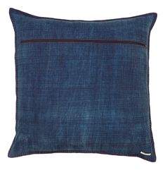 a denim pillow with zippers on the side