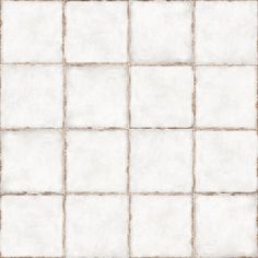 a white tile wall with brown grungy squares on the top and bottom half