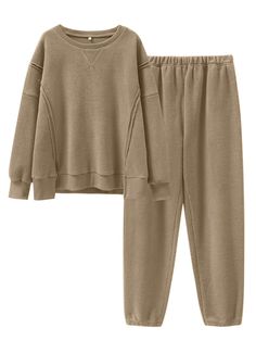 PRICES MAY VARY. Size - S=US(4-6), M=US(8-10), L=US(12-14), XL=US(16-18), see details in rich description. Features - This cozy loungewear set is crafted from fuzzy fleece fabric and includes a long-sleeve crewneck sweatshirt with side slits, a longer back hem, and jogger pants for a stylish yet comfortable look. Material - Made of 100% Polyester, this set features a soft fabric that feels like a warm hug. Perfect for lounging at home or stepping out in comfort. Occasion - The womens 2 piece set Winter Sets With Relaxed Fit And Long Sleeves, Relaxed Fit Long Sleeve Winter Sets, Comfortable Home Outfits, Winter Long Sleeve Relaxed Fit Sets, Cozy Solid Color Long Sleeve Tracksuit, Cozy Long Sleeve Winter Tracksuit, Winter Cozy Long Sleeve Tracksuit, Long Sleeve Fleece Sets For Fall, Cozy Long Sleeve Tracksuit