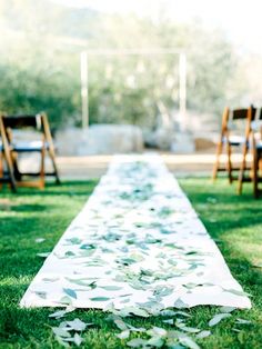 an image of a wedding aisle with flowers on it