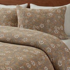 the comforter is neatly made and ready to be used in this bedding set