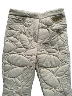 Beige. Fully quilted. Oval designPre order. Expect delivery within 3-4 weeks (be aware that this is may become longer depending on our suppliers schedule).The material is hardwearing, we suggest sizing up.We also offer a number of other colours, please get in touch to discuss. No returns or exchanges on pre-order pieces.Dry clean only. Quilted Garments, Womens Trouser, Quilt Patch, Trouser Design, Baggy Shorts, Be Aware, Fashion Story, Fashion Ideas, Trousers Women