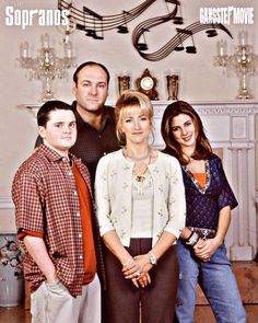 a family posing for a photo in front of a fireplace with musical notes on the wall