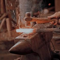 a person working on an object with a hammer