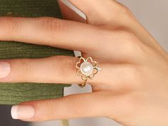 Pearl Clover Ring I'm sure this very elegant ring, decorated with gold, pearl and zircon stones, will bring you a lot of luck.  Your friend to whom you gifted a 4-leaf clover ring is already very lucky. Because he has you. PRODUCT INFORMATION DETAİLS *Metal Type: Solid 8K/14K/18K (White/Yellow/Rose) Gold *Center Gemstone: White (Pearl quality freshwater pearls with very high luster and smooth surface.) *Pearl Size: 6.5 mm *Ring Weight: 2 Gram *Side Stone: 1.10 mm *Upper Part Width: 17mm DIAMOND Gold Pearl Ring With Cubic Zirconia For Anniversary, Gold Cubic Zirconia Ring For Anniversary, Gold Pearl Ring With Cubic Zirconia For Gift, Gold Pearl Ring With Diamonds As Gift, Gold Pearl Ring With Diamonds For Gift, Gold Pearl Diamond Ring Gift, Gold Diamond Ring With Pearl For Gift, Lucky Ring, Lucky Leaf