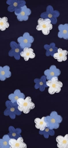 blue and white flowers on a black background with yellow dots in the center, all over