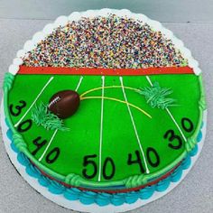 a football field cake with sprinkles on it