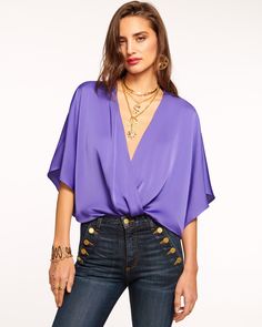 Mckinley V-Neck Bodysuit Satin V-neck Blouse For Night Out, Silk V-neck Top For Night Out, Chic Satin V-neck Tops, Sleek V-neck Blouse For Date Night, Sleek V-neck Party Blouse, Chic V-neck Top For Spring Party, Satin V-neck Top For Work, Glamorous V-neck Blouse For Summer, Glamorous V-neck Summer Blouse