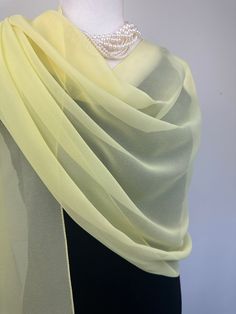 Elevate your style with our exquisite collection of chiffon shawls. Our chiffon shawls are the epitome of elegance and versatility, designed to effortlessly enhance your wardrobe and leave a lasting impression. Made from the fine poly chiffon fabric, these shawls offer a delicate and airy drape that adds a touch of grace to any outfit. Whether you're attending a special occasion, a casual gathering, or simply want to elevate your everyday look, our chiffon shawls are the perfect accessory. Choos Formal Chiffon Shawl, Elegant Chiffon Silk Shawl Scarf, Elegant Sheer Chiffon Scarves, Formal Solid Color Chiffon Silk Scarf, Formal Shawl, Pink Chiffon Scarf, Dressy Clothes, Chiffon Shawl, Chiffon Scarf