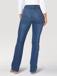 CELEBRATED STYLE STAPLE Few silhouettes are as celebrated as the Wrangler® bootcut. These women's bootcut jeans feature a hip-hugging high rise that flatters your figure while providing the perfect amount of coverage to keep you comfortable through the day. Their contoured waistband allows the style to sit higher in the back for less gaping while the timeless bootcut jeans offer a versatile look you can dress up or down to suit every occasion. With a leg opening that fits comfortably over combat Bootleg Jeans, Cowboy Girl, High Rise Bootcut Jeans, Womens Jeans Bootcut, Wrangler Jeans, Country Girl, Country Outfits, Dark Wash Denim, Country Girls