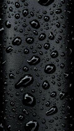 water drops on the surface of a bottle