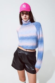 Indulge in the warmth and style of our Turtleneck Sweater in Fluffy Knit, a super comfy and soft addition to your winter wardrobe. This cropped-length sweater features a delightful degrade of pink and blue hues, creating a cozy yet chic look.  Designed for both comfort and fashion, this sweater boasts a turtleneck neckline that not only keeps you warm but also adds a touch of sophistication to your winter ensemble. The long sleeves and soft knit make it the perfect piece to embrace during the colder months.  The stripe design enhances the visual appeal, adding a playful and trendy element to your style. The regular fit ensures a comfortable and flattering silhouette, making this sweater an ideal choice for everyday wear.  Crafted from a blend of 58% acrylic, 29% polyester, 9% polyamide, an Soft Knit Cropped Sweater, Soft Knit Blue Sweater For Cold Weather, Trendy Blue Sweater For Cold Weather, Cozy Fit Cropped Sweater For Winter, Trendy Cozy Fit Cropped Sweater For Winter, Blue Cozy Warm Sweater, Blue Soft Knit Turtleneck Sweater, Spring Cozy Cropped Sweater With Soft Texture, Cozy Cropped Sweater For Spring With Soft Texture