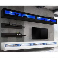 a modern living room with built in entertainment center