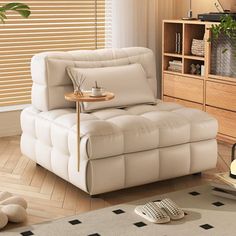 a living room scene with focus on the reclining chair and coffee table in the foreground