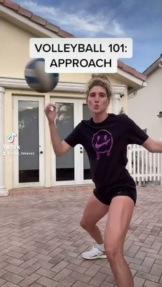 a girl is playing with a ball in front of a house and the words volleyball 101 approach are above her