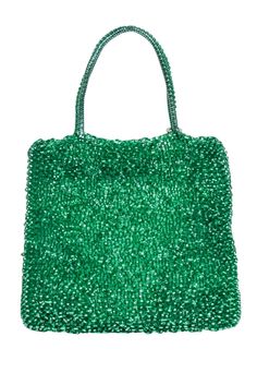 Introducing the Anteprima green coil bag - designed to add some razzle-dazzle to your vacation style! This mini handbag features a vibrant green coil design and a blue jewel flag with rhinestone trim. Perfect for a European escape, pair it with a slip dress and mule heels for a chic and playful look. Stretch coil material Beaded and jeweled front Top handles Height 7.5" Width 9.5" Depth 0.75" Strap drop 4.5" Green Beaded Evening Bag, Bohemian Green Beaded Bag, Summer Green Beaded Bag, Luxury Green Beaded Bags, Bohemian Green Basket-shaped Bag, Razzle Dazzle, Rhinestone Trim, Mini Handbags, Vacation Style