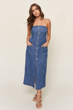 The "Tahoma" dress is everything you love about denim dressing, with all the comfort of breezy linen. This nostalgic piece is inspired by Lo's love for 90s styling and named after her favorite summer hideaway. This strapless style is fitted to be "bra optional" and has a shirred back panel for adjustability and support. Our favorite part about this dress? Besides the pockets, this baby has a gorgeous fixed button placket that ends with a split seam, giving this timeless piece an elevated look th