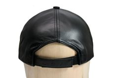 A signature item, the all-time great classic baseball cap in genuine cowhide leather. Structured backing allows it to keep its shape. The USA embossed hook and loop closure allows adjustable fit for most. Available in many colors, it is perfect for wear in any occasion with any outfit. Made in New York, USA. Casual Leather Six-panel Baseball Cap, Casual Leather Baseball Cap With Curved Brim, Black Leather Baseball Cap, Black Leather Snapback Hat With Curved Brim, Black Leather Baseball Cap With Leather Patch, Adjustable Black Leather Baseball Cap, Classic Leather Baseball Cap For Outdoor, Black Leather Snapback Hat, Black Leather Adjustable Baseball Cap