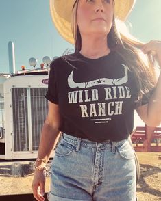 Saddle up cowgirl and lasso in our Wild Ride Ranch western graphic tee for women. Wild Ride Ranch western graphic tee by Ali Dee features a unisex fit body in black with white screen printed art. Sizes: S-3XL Chart in inches: Fitted Crew Neck T-shirt For Rodeo, Casual Cow Print T-shirt For Summer, Western Style T-shirt For Ranch In Summer, Western Style Summer T-shirt, Western Style Relaxed Fit Graphic T-shirt, Western Style Relaxed Fit T-shirt With Graphic Print, Fitted Graphic Print T-shirt For Ranch, Fitted Graphic Print T-shirt For Rodeo, Fitted Western Style T-shirt For Summer