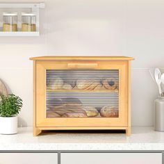 an image of bread baking in the oven on top of a counter with utensils