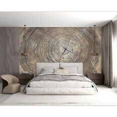 a bedroom with a bed, chair and large wood slice wall mural on the wall