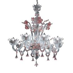 a glass chandelier with pink flowers on it