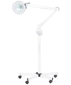 The Marilyn Magnifying Lamp on Casters is a 5 Diopter Magnifying Lamp that comes with both a stand and a rolling base. This lamp has a 37" extendable arm making it fully adjustable for any workspace. The base with wheels makes this lamp easy to move around the spa and very versatile. It has an on/off light switch, which also has a protective cover for added safety. When fully extended, this salon mag lamp is 6'3" at its highest point. This magnifying light is designed specifically for use in any Spray Tan Machine, Vibe Rooms, Kids Salon, Barber Equipment, Salon Mirrors, Shampoo Chair, Spa Accessories, Skin Care Spa, Salon Chairs