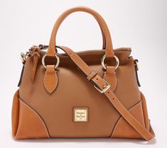 A chic, everyday bag you can carry from the boardroom to brunch, this luxe leather satchel features a classic silhouette with plenty of interior organization for your essentials. From Dooney & Bourke. Interior Organization, Everyday Bag, Classic Silhouette, Leather Satchel, Dooney Bourke, Fashion Handbags, Pebbled Leather, Satchel, Trim