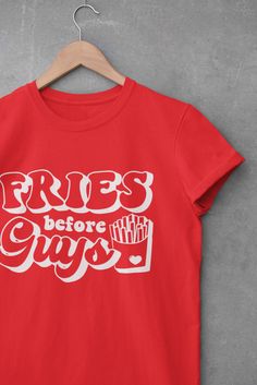 Who says that guys have to be the number one in your life this Valentine's Day. Our statement tee says is all...Fries Before Guys Available in sizes S-4XL unisex tee. Design colors may vary slightly from image. Fun Red T-shirt With Letter Print, Fun Red Letter Print T-shirt, Red Graphic Tee With Funny Text, Funny Red Slogan T-shirt, Red Funny Slogan T-shirt, Shirt Design Inspiration, Business Events, Statement Tees, Clothes Horse