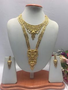 Handmade Indian Jewelry Asian Wedding Bridal Jewellery Party Ethnic Wear 22ct Gold Plated Bridal Necklace Set Rani Haar Bridal Jewellery Set  PLEASE NOTE, This Item Is Not Real Gold .Only Good Quality Gold Plated Jewellery .it is Artificial jewellery. It is a perfect match with formal attire on special occasions or with casual wearing.  Slight Colour variations possible due to difference in screen and photograph Care instructions Keep Jewellery away from direct heat, water, perfumes, deodorants Heavy Gold Jewelry Sets For Festive Season, Gold Kundan Necklace For Eid, Gold Temple Necklace With Intricate Design Bollywood Style, Gold Temple Jewelry Set For Puja, Gold Bollywood Temple Necklace With Intricate Design, Temple Jewelry Gold Jewelry Set For Puja, Bollywood Gold Temple Necklace With Intricate Design, Bollywood Style Gold Temple Necklace With Intricate Design, Bollywood Style Gold Jewelry For Puja