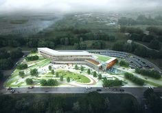 an aerial view of a building surrounded by trees