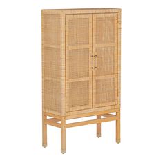 a wooden cabinet with wicker doors on it's sides and legs, against a white background