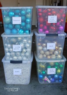 three plastic containers filled with christmas ornaments