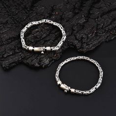 Handcrafted using sterling silver, this bracelet ensures that all eyes are on you thanks to its sleek and modern design. The Delica silver bracelet can complement any outfit, from casual to formal, and can be worn on any occasion. 925 Sterling Silver %100 Handmade 38g = 1.35oz Length: 18-20-22 cm Width: 5 mm = 0,20 in Sterling Silver Box Chain Bangle Bracelet, Sterling Silver Box Chain Bangle, Spiritual Sterling Silver Bracelets With Silver Clasp, Symbolic Sterling Silver Jubilee Bracelet, Traditional Silver Chain Bracelets Gift, Sterling Silver Bangle Bracelet With Silver Chain, Spiritual Sterling Silver Bracelets With Oxidized Finish, Symbolic Sterling Silver Bracelet, Spiritual Sterling Silver Braided Bracelet