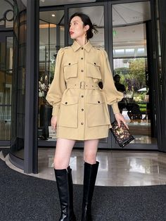 Elevate your style with our Puff Sleeve Thigh Length Utility Coat! The perfect combination of a coat and utility pockets, this coat adds a touch of sophistication to your wardrobe. The thigh length and puff sleeve design provide both fashion and functionality. Upgrade your outerwear game today! ●Front snap closure ●Epaulets●Flap pockets on chest and front ●Puff sleeves ●Spread collar●Removable tie belt ●Lined ●Polyester,cotton,spandex ●Machine wash, line dry ★★Please advise your Height and Weigh Khaki Leather Bags With Pockets, Versatile Beige Satchel For Work, Khaki Leather Shoulder Bag With Pockets, Elegant Beige Shoulder Bag With Pockets, Beige Leather Satchel With Pockets, Modern Shoulder Bag With Multiple Pockets, Brown Shoulder Bag With Multiple Pockets, Fall Beige Shoulder Bag With Leather Handles, Luxury Beige Satchel For Fall