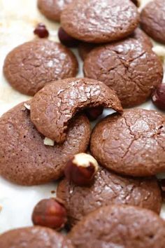 chocolate cookies with nuts are on the table