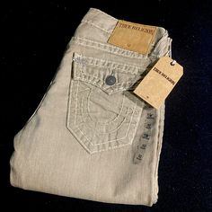 Rare! Brand New With Tags! Ricky Straight Khaki Colored Denim Supert In “Bma Khk Cldo Trl” Size 32x33 Waist Measures 16 1/2” Across Laying Flat With A 33 1/2” Inseam Unaltered And 8” Leg Opening Beautiful Tonal Super T Stitching Throughout The Jean With Contrasting Grey Accents/Bar Tacks And Antiqued Hardware! Suede Leather Tr Logo Back Patch This Is A Grail Pair Of Mine From Between 2012-2014 When True Religion Released A Limited Edition Military Capsule Collection! Insanely Rare To Find Nwt’s Khaki Denim Cargo Jeans, Designer Fitted Cotton Jeans, Designer Cotton Jeans, True Religion Jeans Men, Billy Jean, Blue Y2k, True Religion Men, True Religion Jeans, Denim Jeans Men