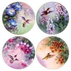 four plates with hummingbirds and flowers painted on them