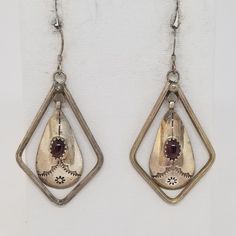 "Vintage Sterling and Garnet Earrings Hallmarked SC. Stanley Bain? They are 1 5/8\" x 1\" x 1/8\" with a ¾\" drop. Stamped SC Sterling on back of earrings and 925 on posts. They weigh 0.26 ozt. Are these stones real or fake? Aside from diamonds, we do not know if any gemstones are natural or synthetic. We will state on certain gemstones, that we know 100%, if they are created or fake due to their lack of inclusions. For this reason, we do not sell any diamonds without inclusions, and the larger European Jewelry, Seashell Earrings, Vintage Fine Jewelry, Star Sapphire, Garnet Earrings, Pure Gold, Selling Jewelry, Light Source, Jewelry Stores