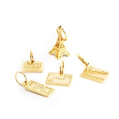 5 Solid Gold Mini Charms Bundle Gold Charms With Removable Details For Everyday, Luxury Gold-plated Charm Necklaces, Luxury Gold Plated Charm Necklace, Yellow Gold-plated Charms With Dangling Details, Yellow Gold-plated Dangling Charms, Luxury Charm Necklaces With Logo, Luxury Removable Charms For Gifts, Gold Charm Necklaces As Souvenirs, Luxury Yellow Gold Charms With Removable Details