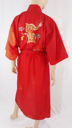 "Dragon Kimono Robe Women's Mens Red Tie Dye Colorful Embroidered Dragon Pockets Belted Excellent Condition Vintage by PLUM BLOSSOM Size M Modern robe take on kimono. Gorgeous calf length robe with colorful embroidered dragon on back and pockets. Gorgeous red and deep orange tie dye fabric, wide sleeves, with belt and front pockets. In excellent condition. Easy to wear casual chic vintage for the disco sporting life. MEASUREMENTS: Length - 49\" Bust (underarms to underarms) - 26\"x2 Sleeve (shou Traditional Red Summer Kimono, Traditional Red Kimono For Summer, Traditional Red Embroidered Kimono, Traditional Red Cotton Kimono, Festive Red Embroidered Kimono, Dragon Kimono, Red Tie Men, Robe Women's, Ladies Caftan