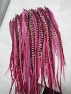 PRICES MAY VARY. Five Feathers in One Extension: Includes 5 feathers bonded at the tip, ranging from 6 to 10 inches in length, creating one seamless extension. Pink, Grizzly, and Brown Mix: A striking blend of pink, grizzly, and brown feathers that adds a boho-chic vibe to any hairstyle. Easy Application: Comes with 2 silicone beads and instructions for a simple application process (tools not included). Washable and Curlable: These feathers can be styled, washed, and curled, just like your natural hair, providing versatility in styling. Long-Lasting Wear: With proper care, the extension can last for months, making it a durable addition to your hair routine. Suitable for All Hair Types: Ideal for adding a unique touch to all hair types and styles, whether for daily wear or special occasions Orange Dreadlocks, Feathers For Hair, Edc Hair, Hair Color Brush, Hair Feathers, Feather Extensions, Feather Hair Extensions, Hair Color Chart, Dyed Hair Inspiration