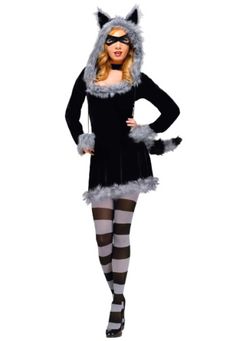 a woman in a cat costume is standing with her hands on her hips and legs crossed