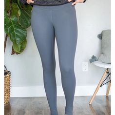 These Tummy Control Stirrup Leggings Will Be Your Next Obsession! Squat Proof, Tummy Control And We Are Bringing Back The Stirrup Feature So You Can Wear Them In Any Shoe Or Boot Without The Issue Of Them Rolling Up! Oh, And Not To Mention There Is A Hidden Pocket On The Inside Waist Band! Perfect For Leisure, Date Night, Working Out Or Under Your Snow Suit! S(0-4) M(6-10) L(12/14), Xl(16/18) 2x(20/22) 3x(24/26) Gray Elastane Leggings For Loungewear, Gray Leggings With Elastic Waistband, Gray Stretch Leggings With Elastic Waistband, High Stretch Gray Bottoms For Pilates, Gray Elastane Activewear For Loungewear, Fitted Mid-rise Gray Leggings, Gray Fitted Mid-rise Leggings, Gray Tight Yoga Pants For Loungewear, Gray Yoga Pants With Elastic Waistband